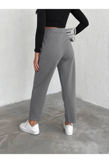 KREP SÜS DÜĞMELİ BELİ LASTİKLİ HAVUÇ KALIP PANTOLON