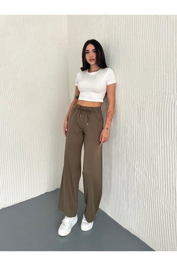 İP BAĞCIKLI PARÇA DETAYLI RAHAT KESİM DABIL KUMAŞ PANTOLUN