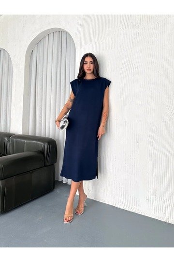 YUMUŞAK DOKU YIRTMAÇLI VATKALI MODAL KUMAŞ MİDİ ELBİSE Doku
