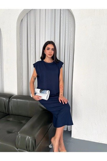 YUMUŞAK DOKU YIRTMAÇLI VATKALI MODAL KUMAŞ MİDİ ELBİSE Doku
